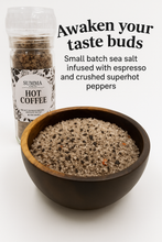 Load image into Gallery viewer, Bowl of Hot Coffee Salt with Summa Salts grinder in background, featuring espresso and pepper flake texture
