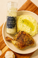 Load image into Gallery viewer, Garlic Chicken Salt by Summa Salts pictured next to crispy roasted chicken leg and mashed potatoes with melted butter – a flavorful herb salt seasoning
