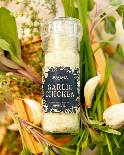 Garlic Chicken Salt in glass grinder – herb seasoning with garlic, thyme, and sage